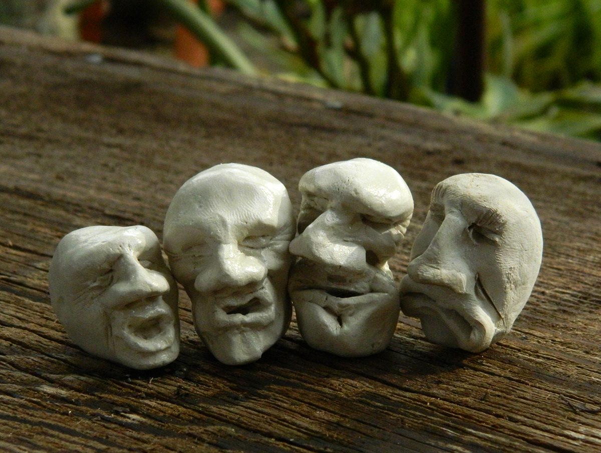 stecca Gerry Stecca clay heads hand made installation