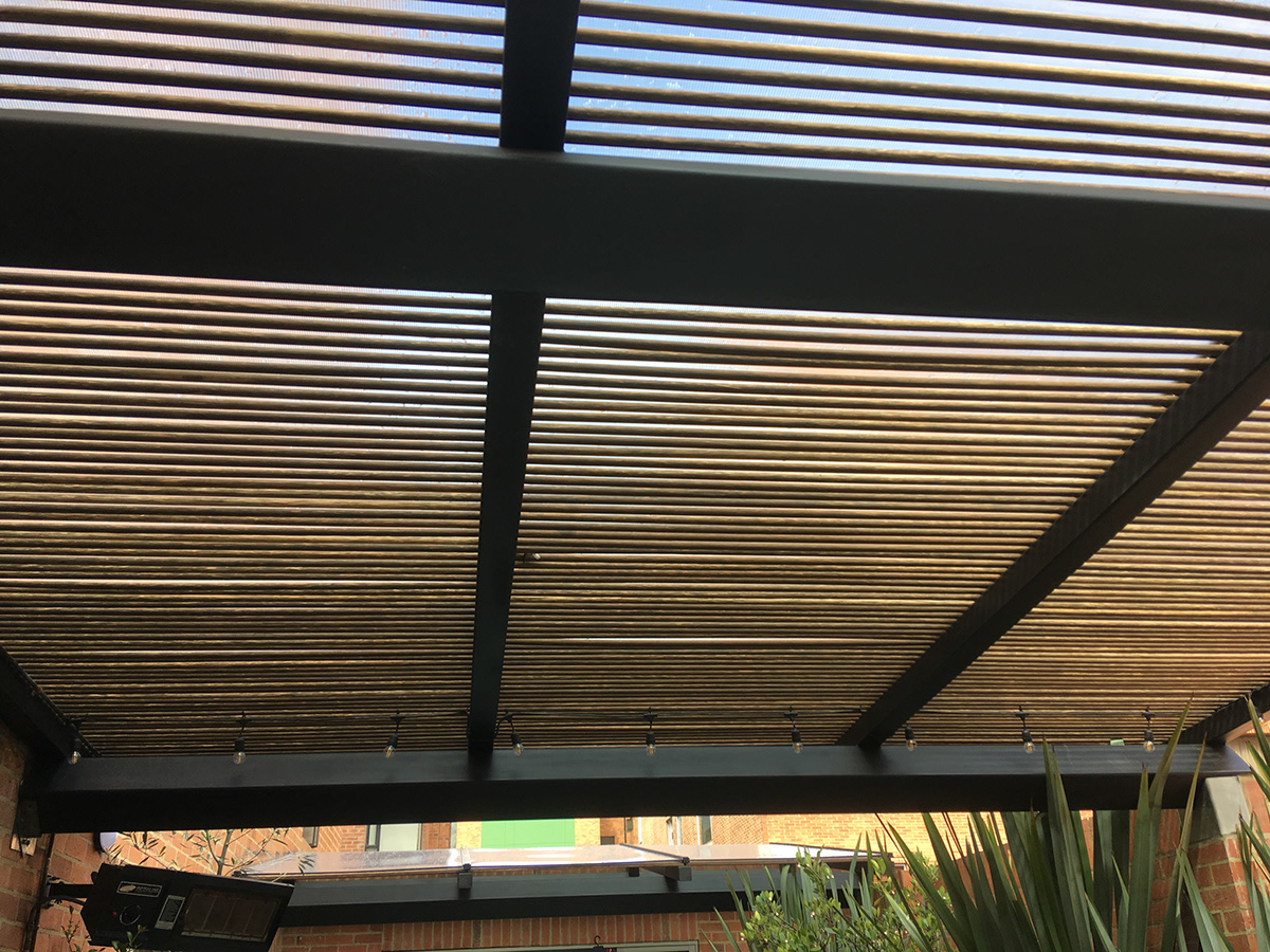 pergola roof terrace structure metallic polycarbonate wood