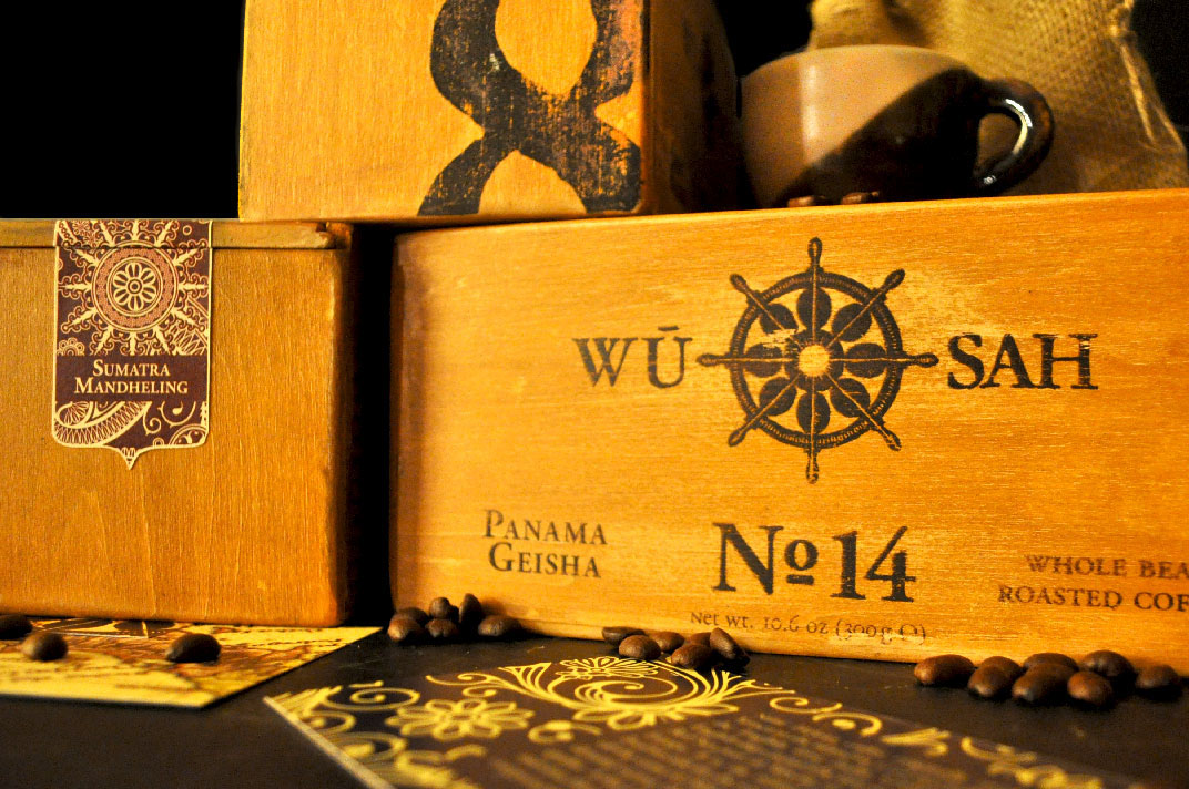 Coffee Garamond wusah Packaging boxes wood wooden brand logo overseas sea Ocean luxurious luxury upscale expensive beans flavors delicious peaceful peace Harmony Buddhist dharma wheel pirate ship globe Global