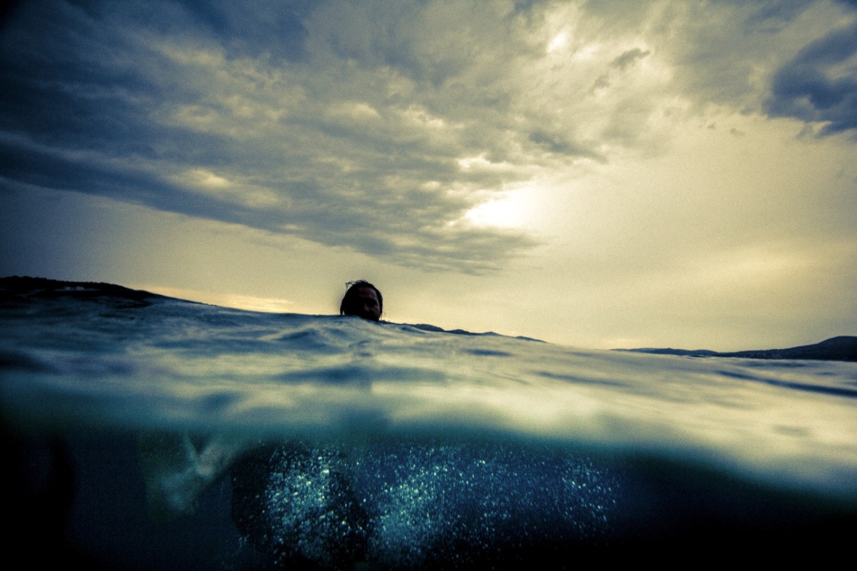 Croatia  Trogir  underwater Clive Newson  Photography  two tone beach sea rain swim water