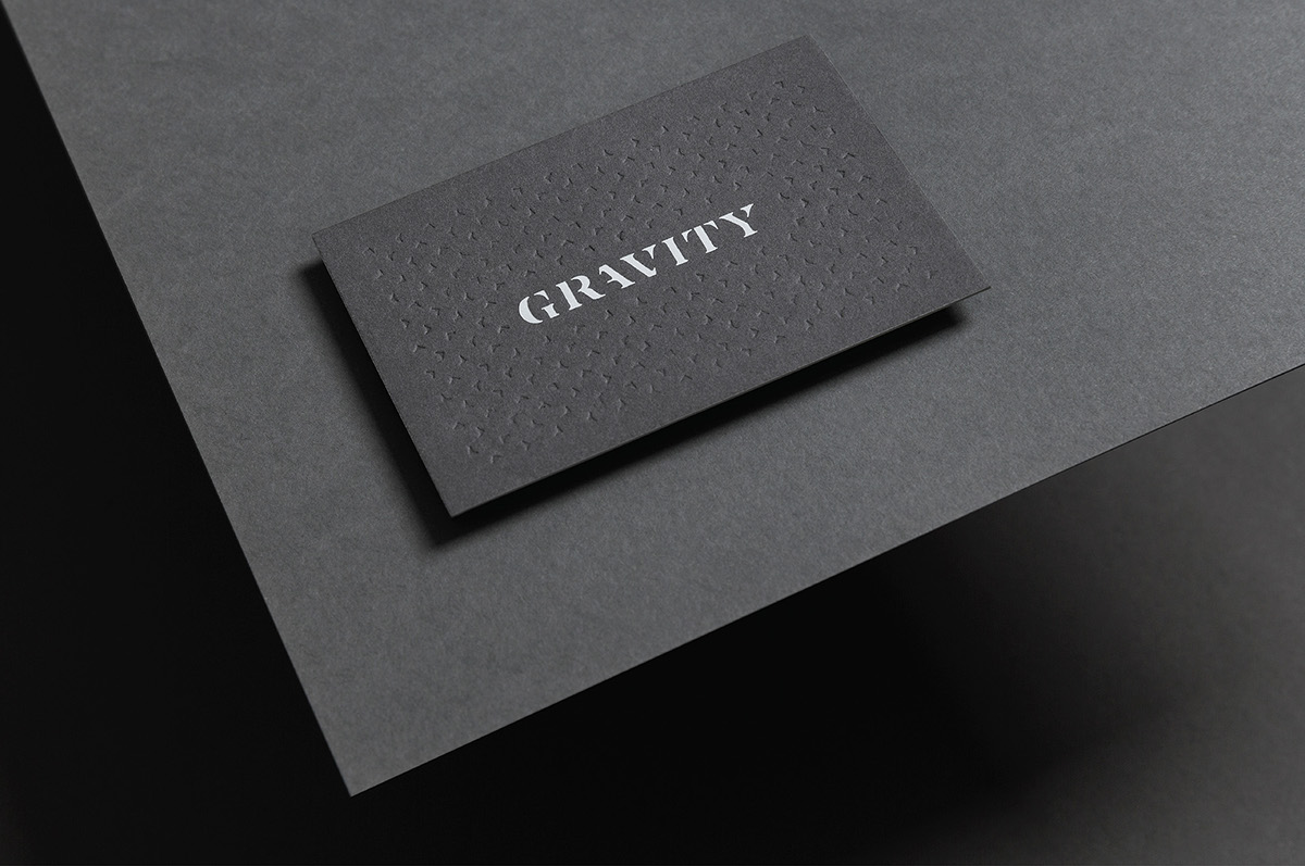 gravity brand gold logo elegant identity foil paper material emboss