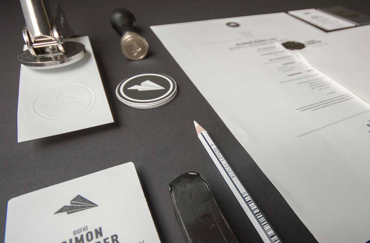 Paper plane black on black Corporate Design identitiy