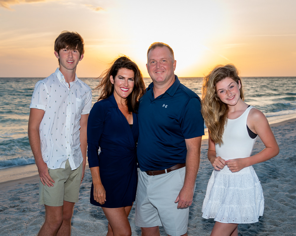 beach family family photography Gulf of Mexico Ocean portrait sand sunset water