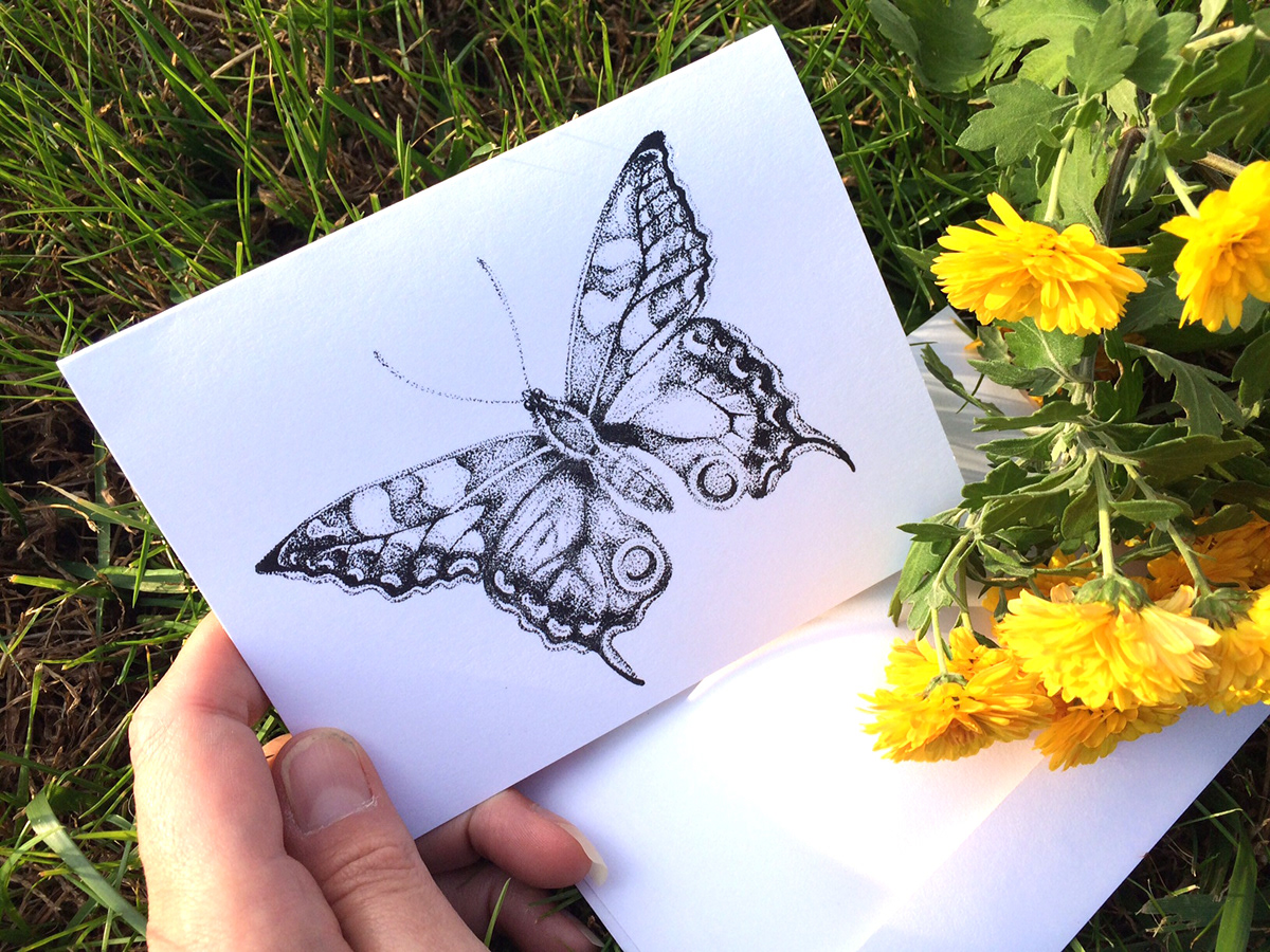 Note card with my hand drawn pen and ink illustration of a butterfly drawn in stipple dots