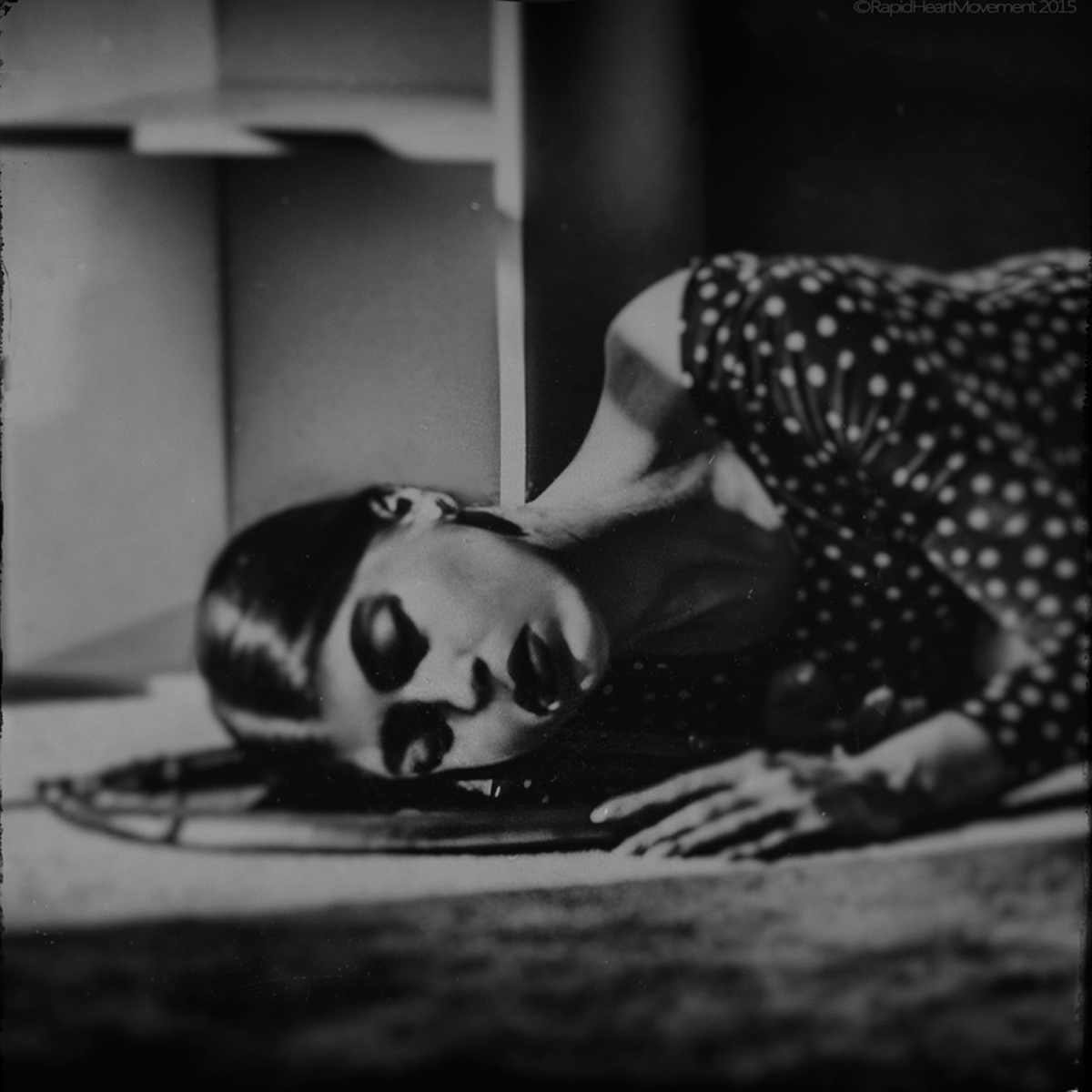 photo conceptual black and white mirrored portrait RapidHeartMovement