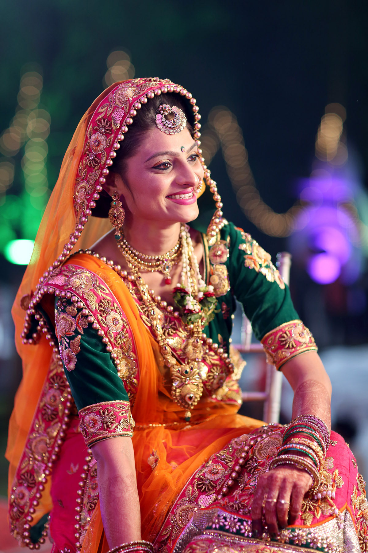wedding portraits coupleshoot indianweddings colorful decoration bokeh lights