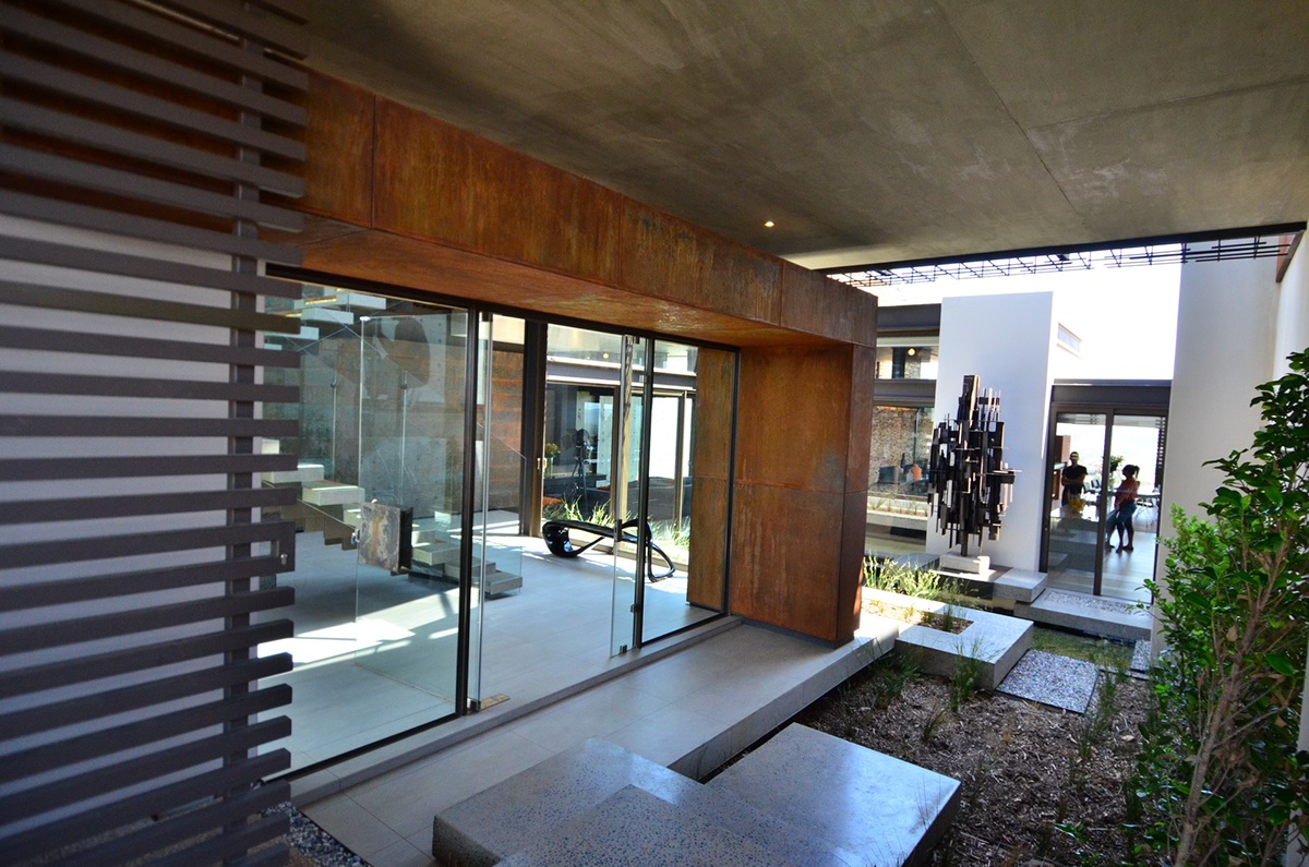 contemporary design home architecture  architectural contemporary home steel rusted steel stone clad