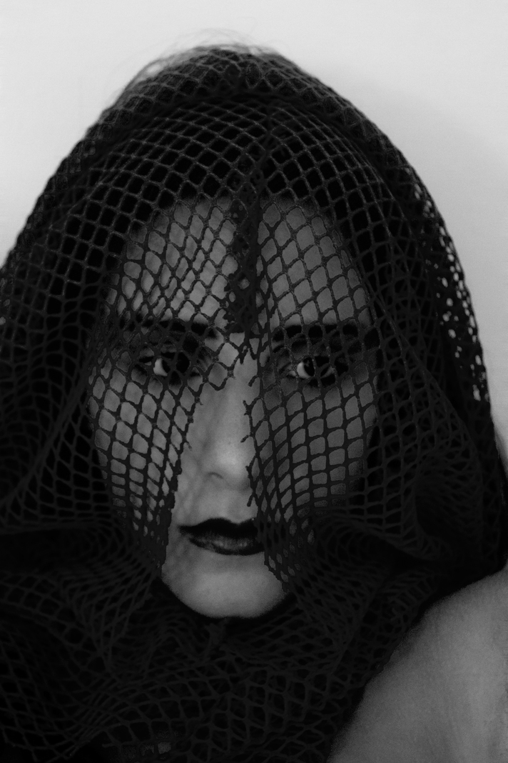 black and white portrait Monochromatic oppression net woman
