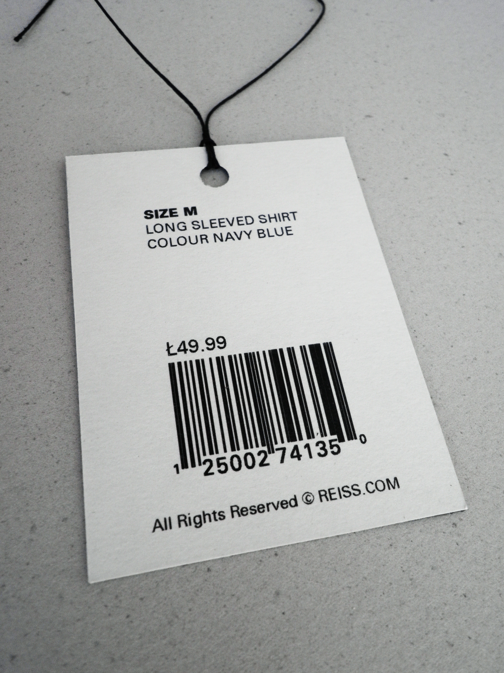 reiss clothes store identity guidelines