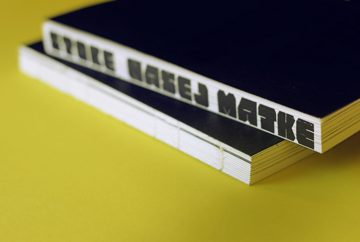 book design re-design screen-printing fore-edge black on black hand sewn binding book design lettering black leather punk fore-edge typography silk screen Munken