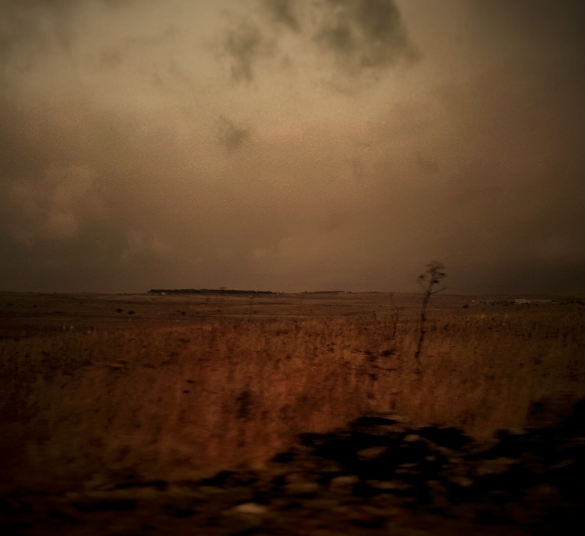 On the road Travel wild desolate landscapes Nature stormy SKY clouds sunset