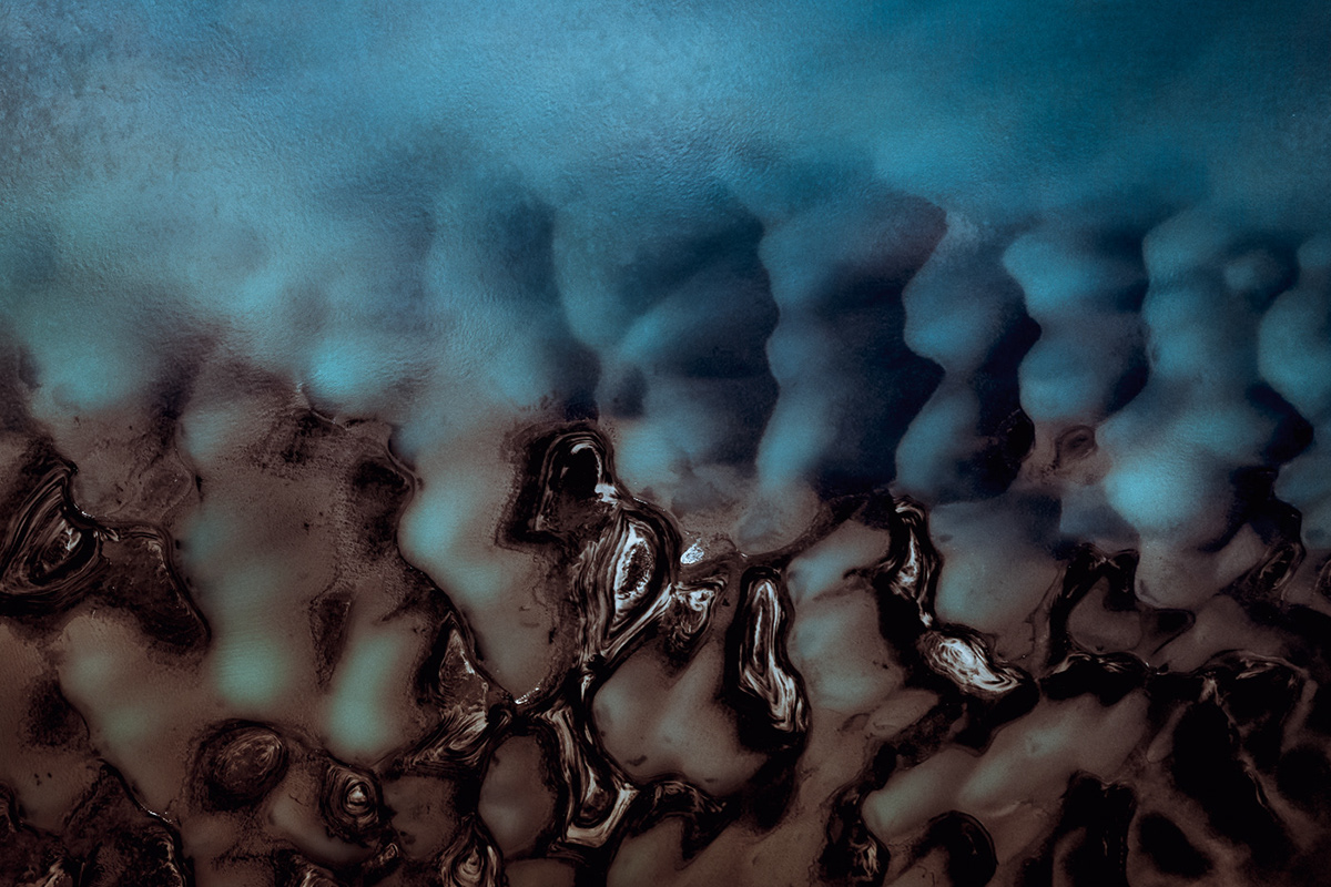 flow river Aerial norway abstract blue brown colors drone texture