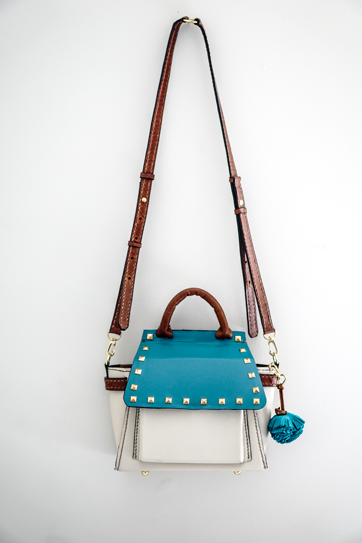 Adobe Portfolio accessory design handbag backpack convertible Rivet hand stitch leather