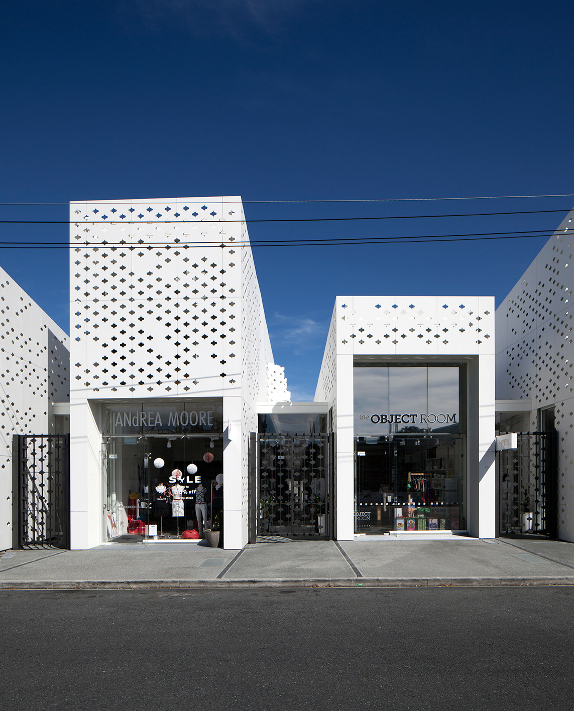 Shops new building temporary White metal pattern newzealand auckland architectrure design Urban Street sculpture facade