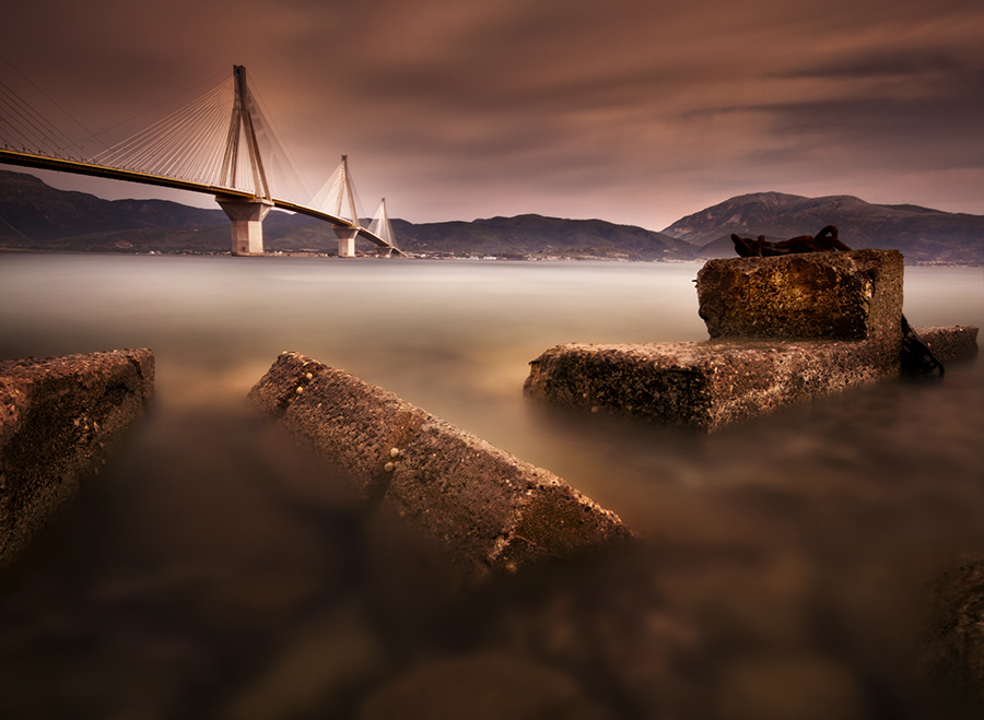 seascape town patra Greece lighhouse bridge pier sunset