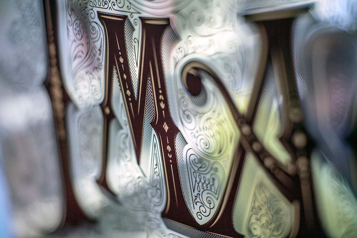 imaginarium vintage type black gold anton Burmistrov Swirls ornaments flourishes Estonia Tallinn Brave agency glass