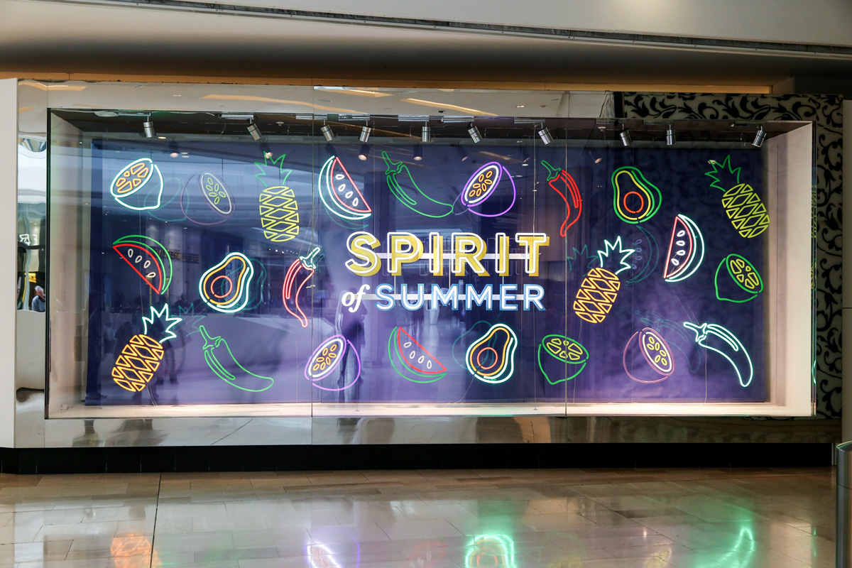 M&S windows visualmerchandising   neon acrylic illuminated Fruit summer scheme