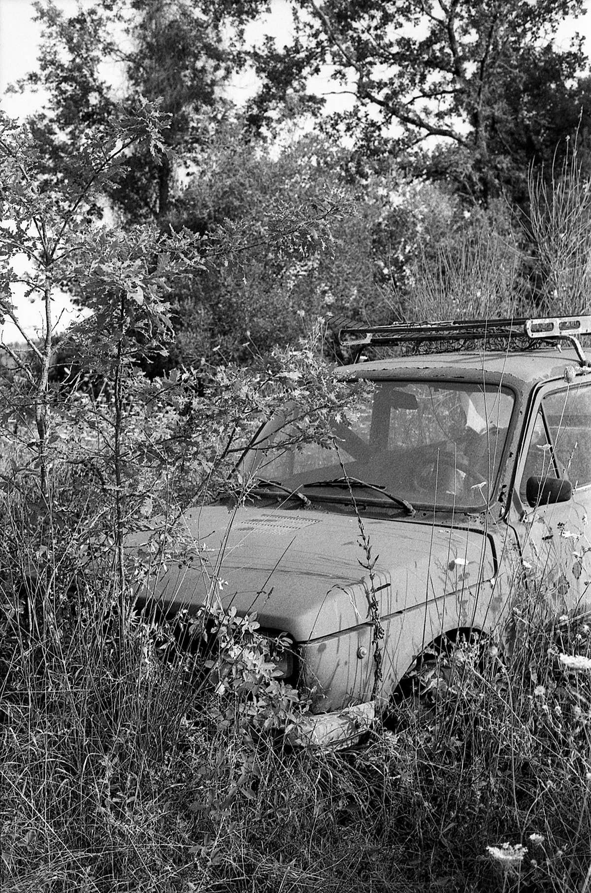 35mm abandoned analog black and white bw Film   forgotten Photography  ruins car