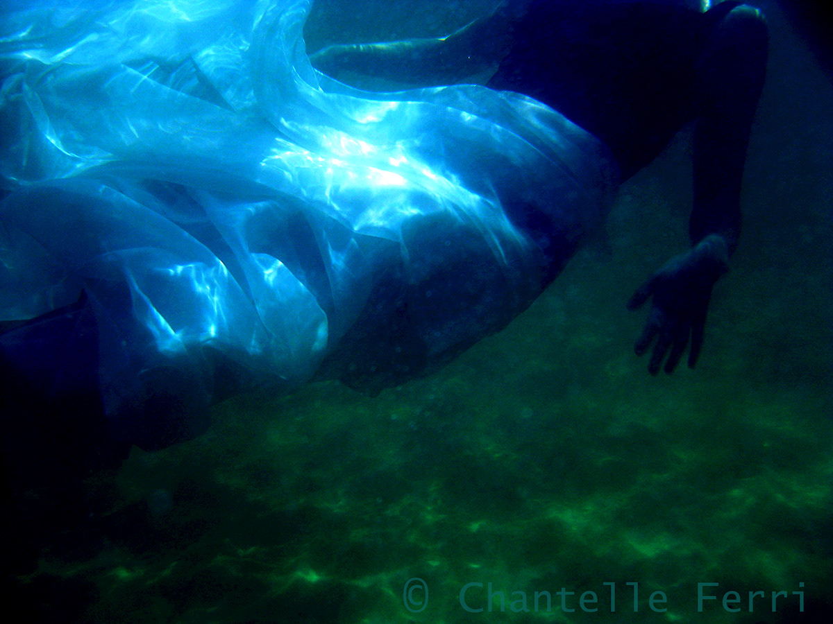 underwater girl reflection dark Moody submerged water fabric floating sinking aqua light swimming sea