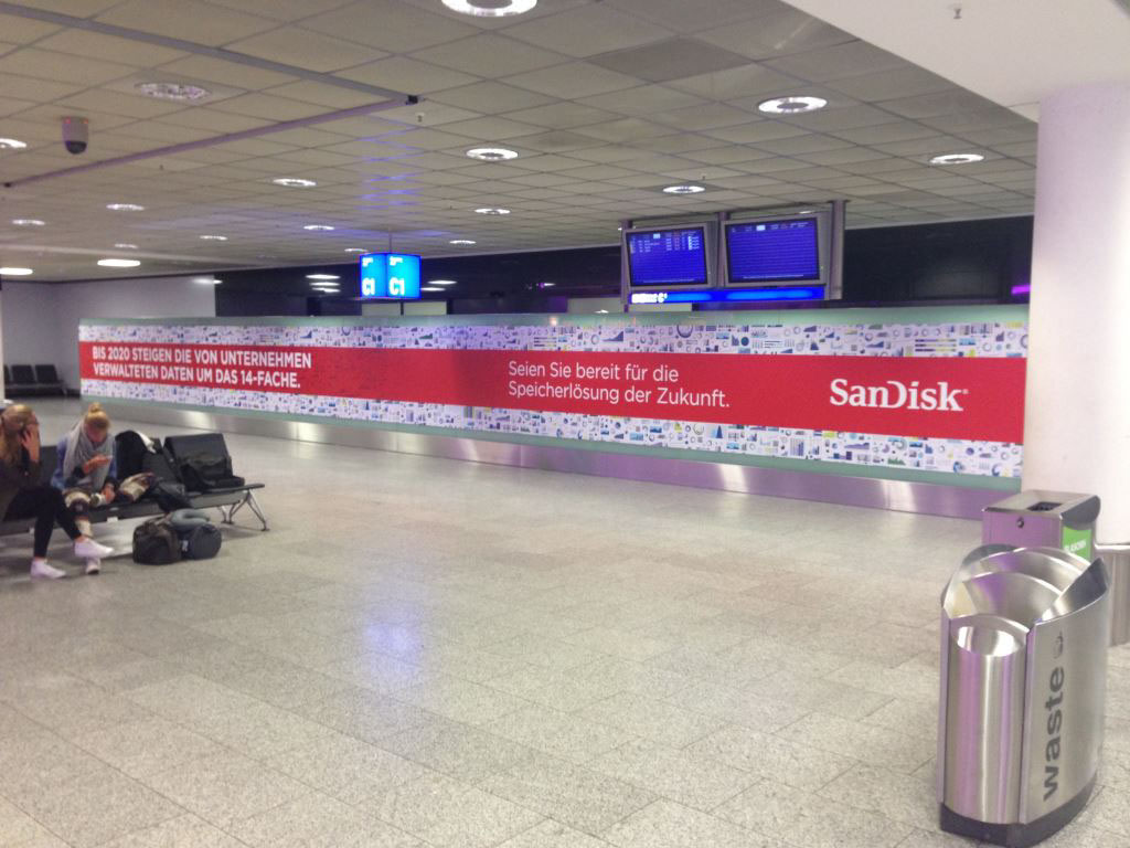 sandisk tech print OOH airport advertisement Adaptation
