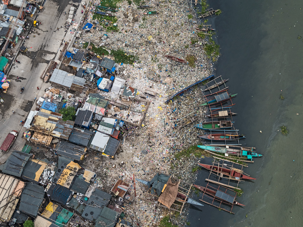 Manila philippines Aerial overpopulation ships harbour fishing fisherboat meagcity polution
