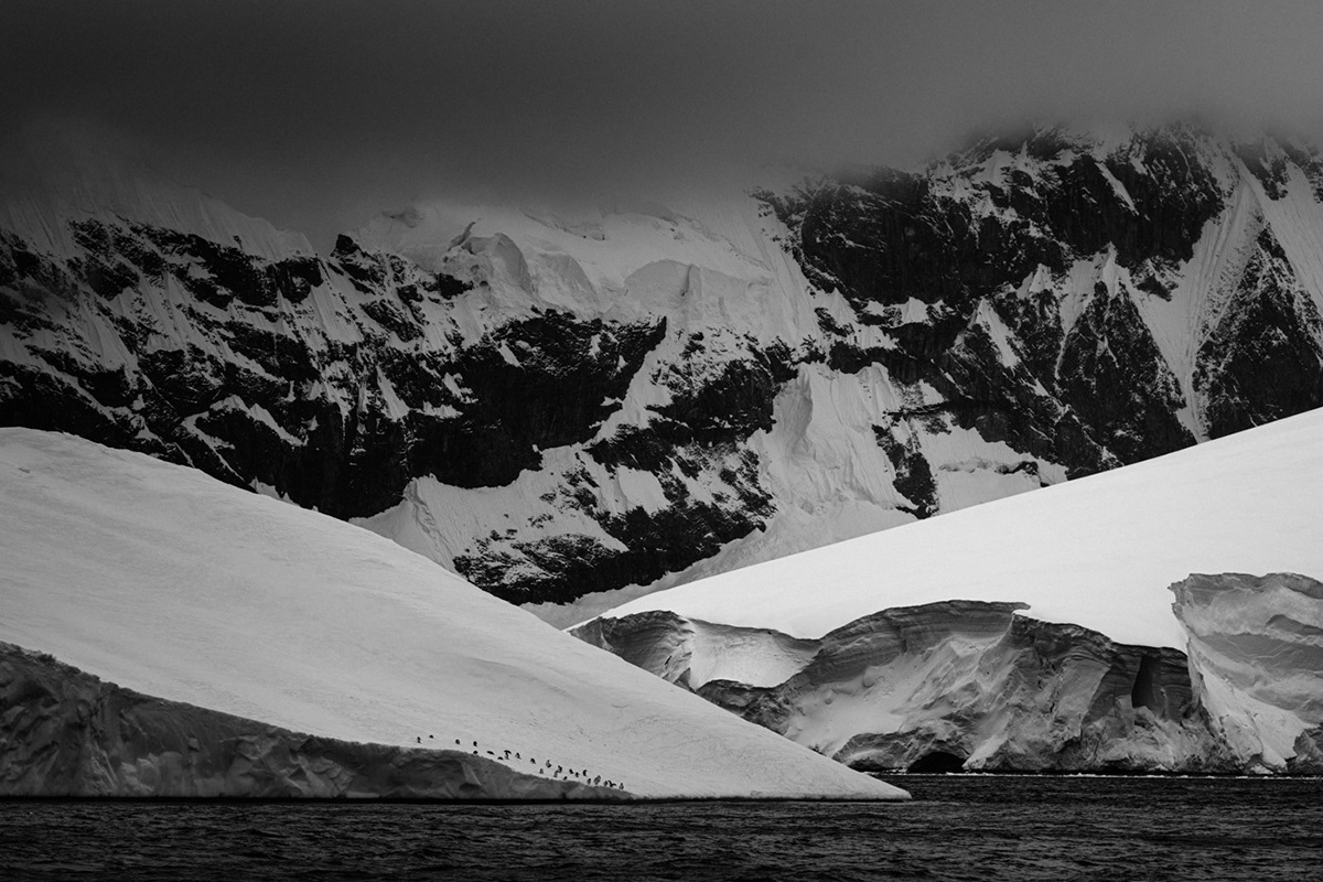antarctica black & white clouds dark glacier ice Landscape mountains peak snow