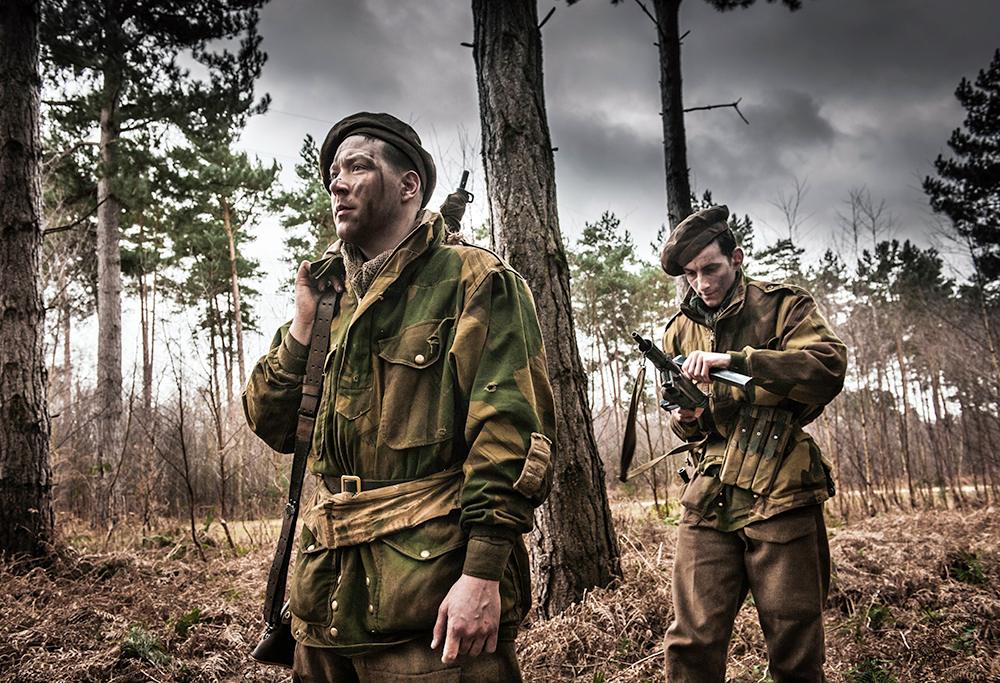ww2 living history re-enactors battle german soldiers german camourflage uniform War Film Set guns woodland winter