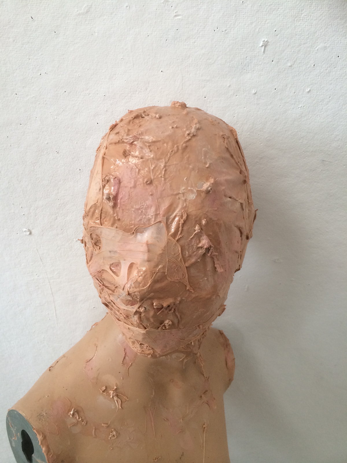 mannequin latex ripping violent flesh