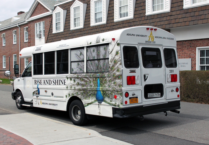 Vehicle Wrap Out-of-Home decals Bus Wrap installation design higher education graphics