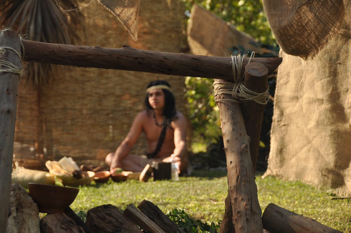 Taino indians short film movie costumes feathers actors hut village time piece makeup tattoos tribal Native beads Loincloth wood Nature forest jungle beach sand props fruits weapons