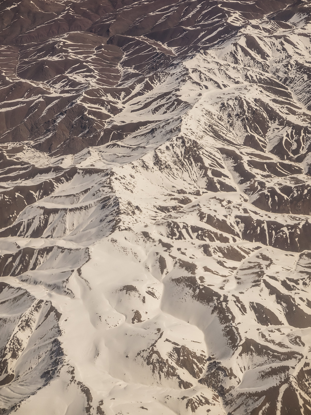 Aerial mountain zagros Iran plane MORNING light colors snow rocks peak minimalistic places Travel view