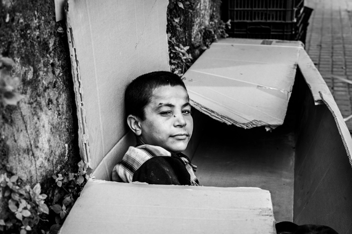 boy box portraits street photography Poverty