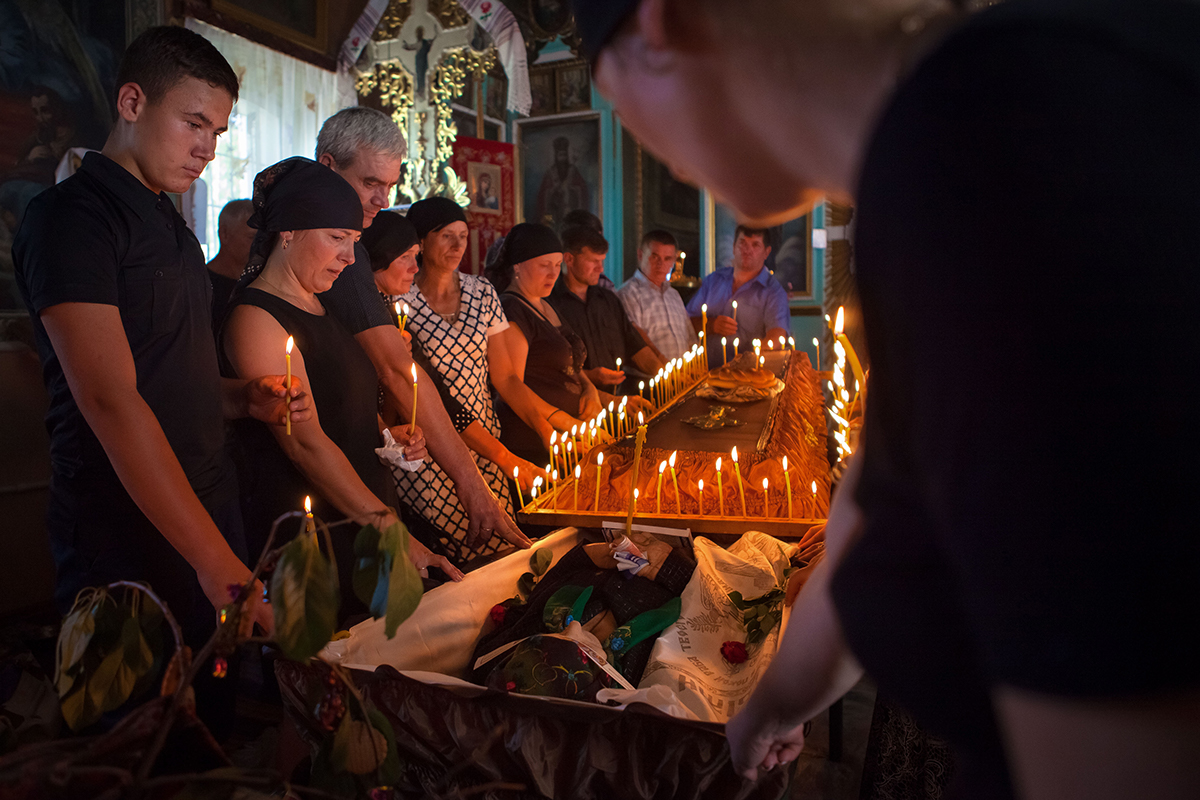 Moldova Europe eastern europe post soviet funeral death dying dead sad Sadness family goodbye