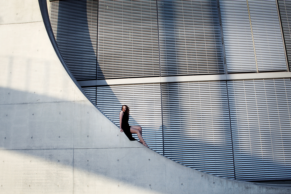 berlin building concrete structure walls figure person between lonelyness monochrome light reflection Shadows rhytm woman
