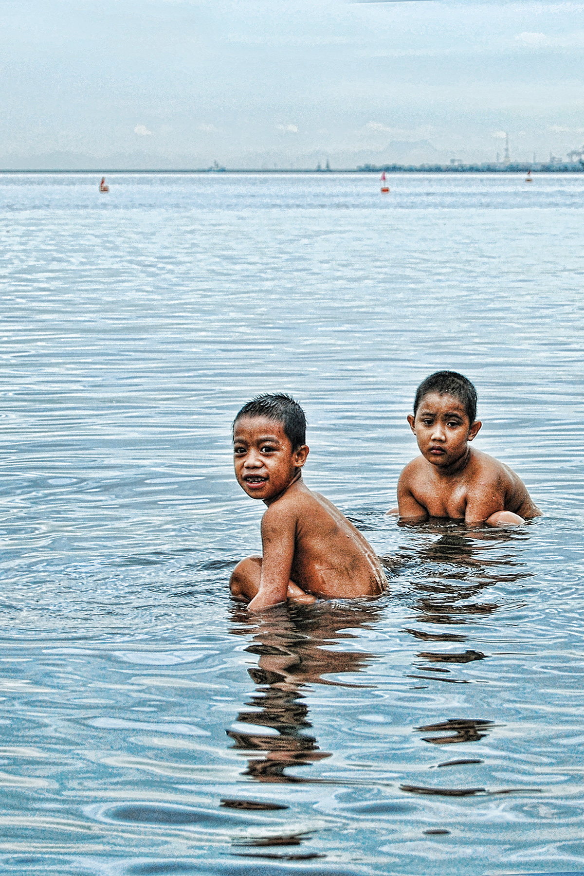 children Manila Bay philippines Manila Playground Haven paradise Opposites bighani innocesnse play swim bay water