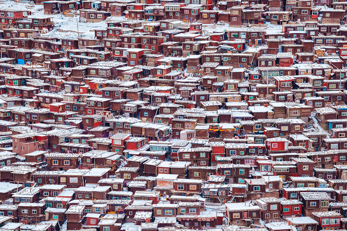 Sichuan Travel intensive snowfall figurative red sertar Tibetan monks buddhism