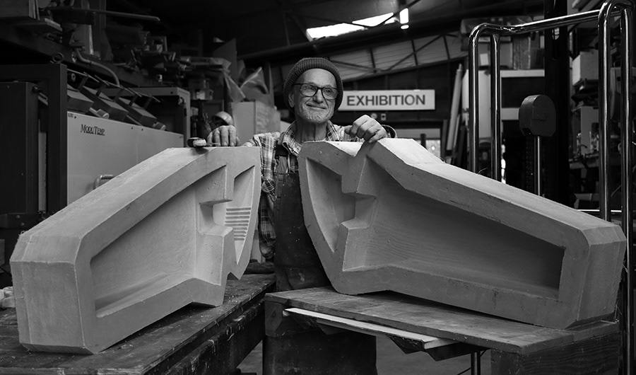 Australian artist Peter Kovacsy with two large mould for making cast glass sculpture.