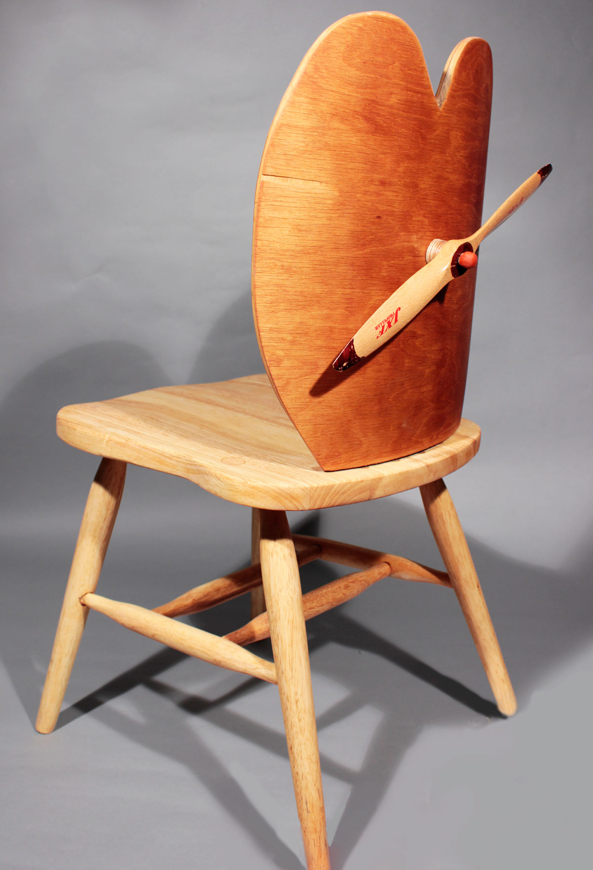 repurposed furniture art found object pinwheel flight chair
