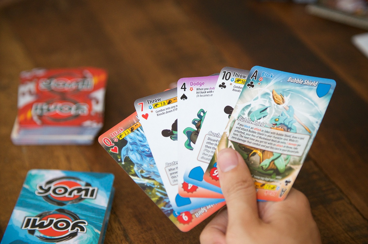 card game yomi fighting game asymmetric balance