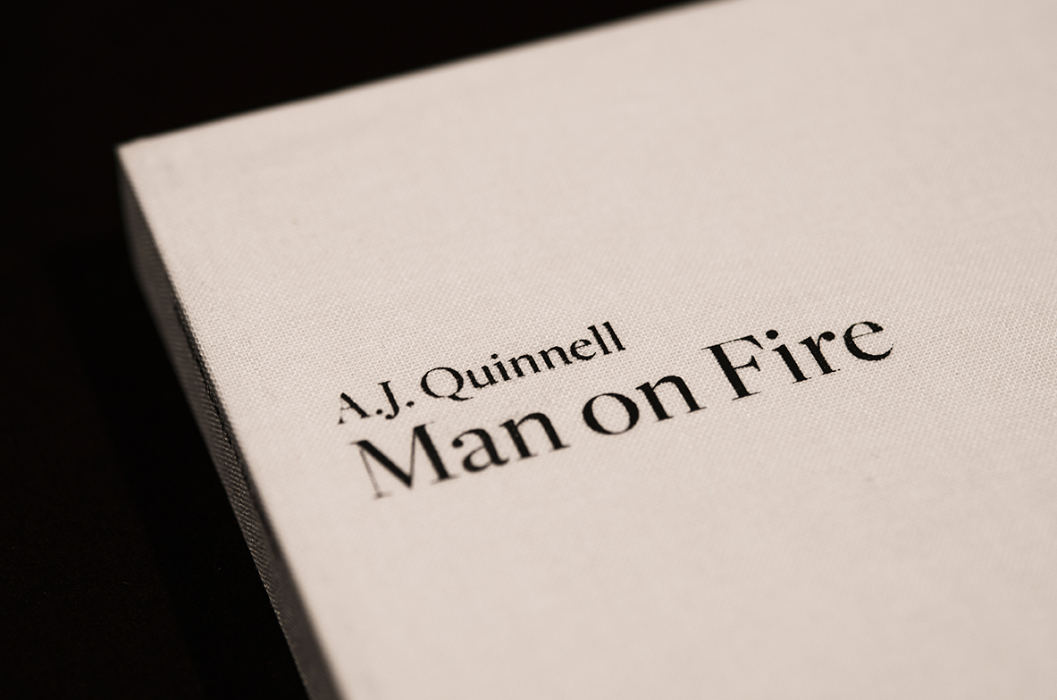 A.J. Quinnell Buchgestaltung typographical staging man on fire