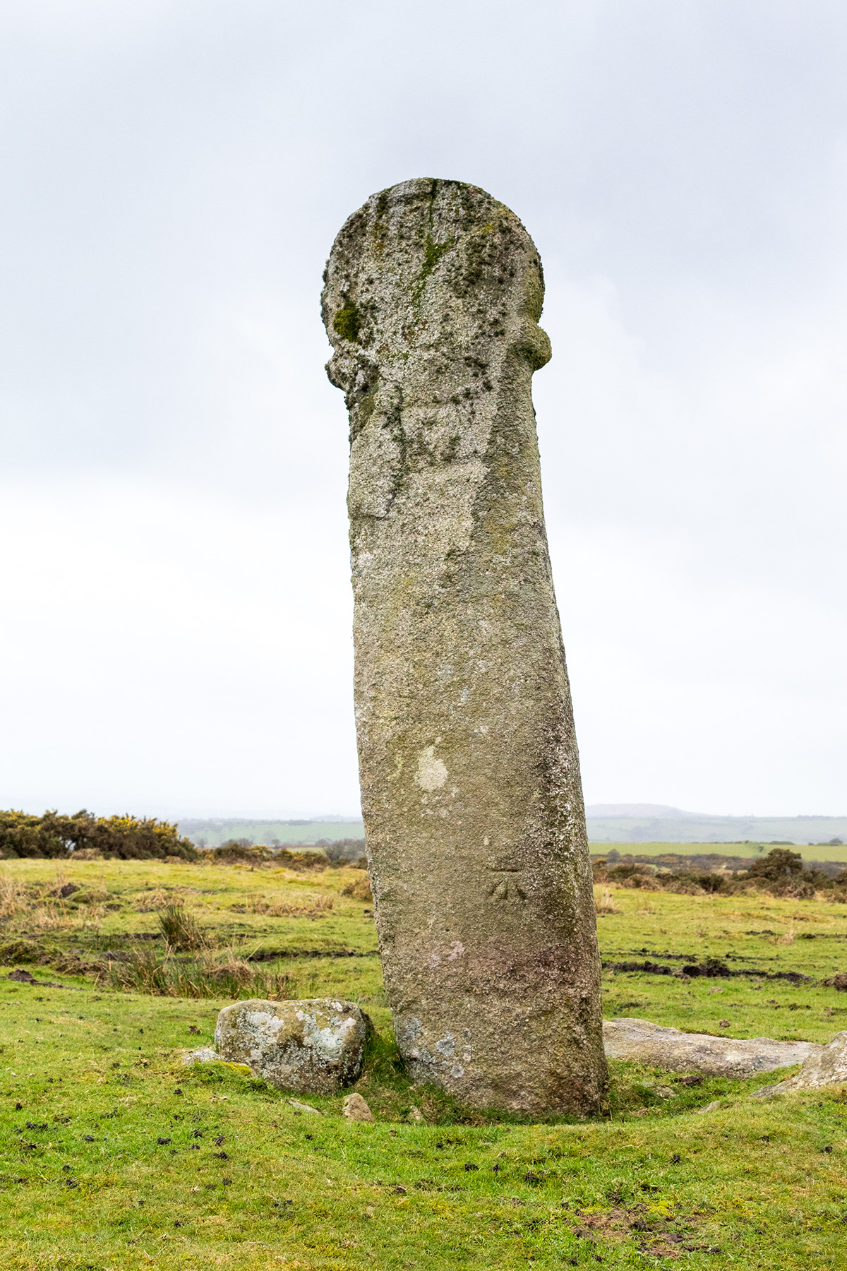 Long Tom A prehistoric standing stone repurposed in the 1600's as Christian cross for worship 