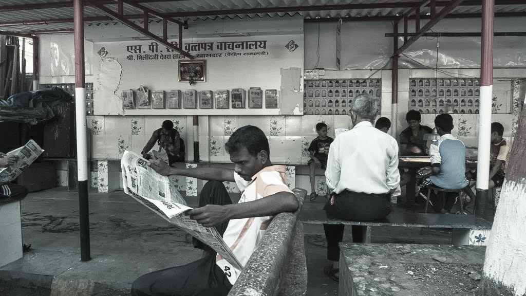 Newspaper reading in MUMBAI