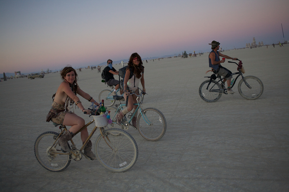 mathieu young Burning Man 2011 desert people Gathering burning community city temple man dancing art bikes