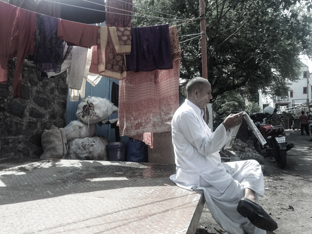 Newspaper reading in MUMBAI