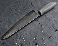 DAMASCUS KNIFE with a concrete handle