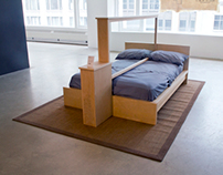 Bed frame with mirrored partition