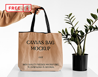 Free Women Holding Big Canvas Bag Mockup