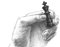 hand with chess piece