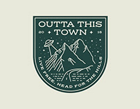 Outta This Town Live Free Badge