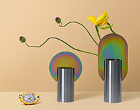 Limited edition vases in rainbow zinc plating steel.
